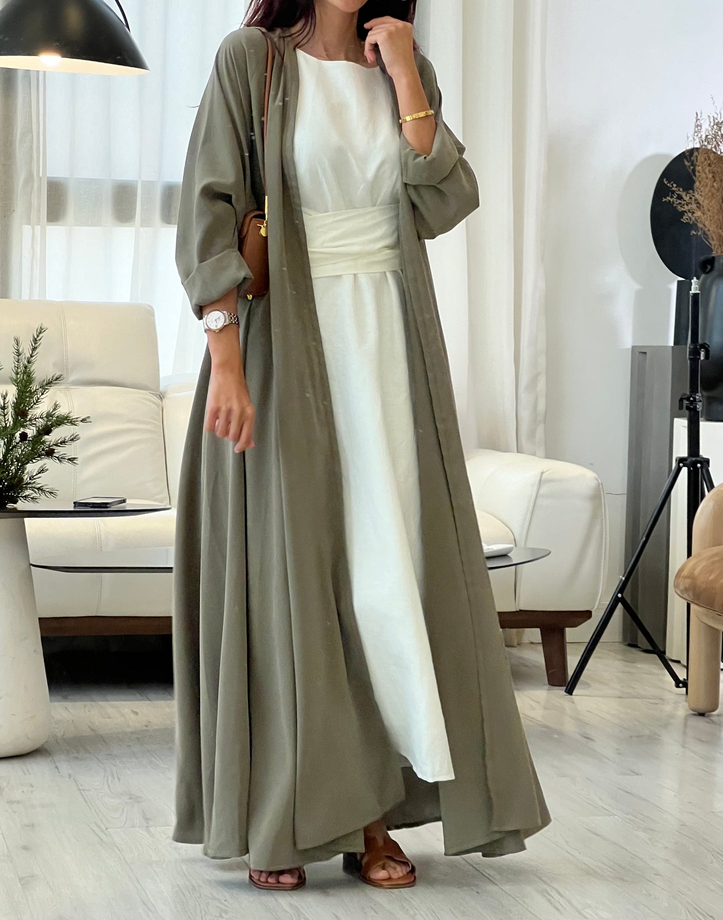 Olive green flowy abaya, front product 