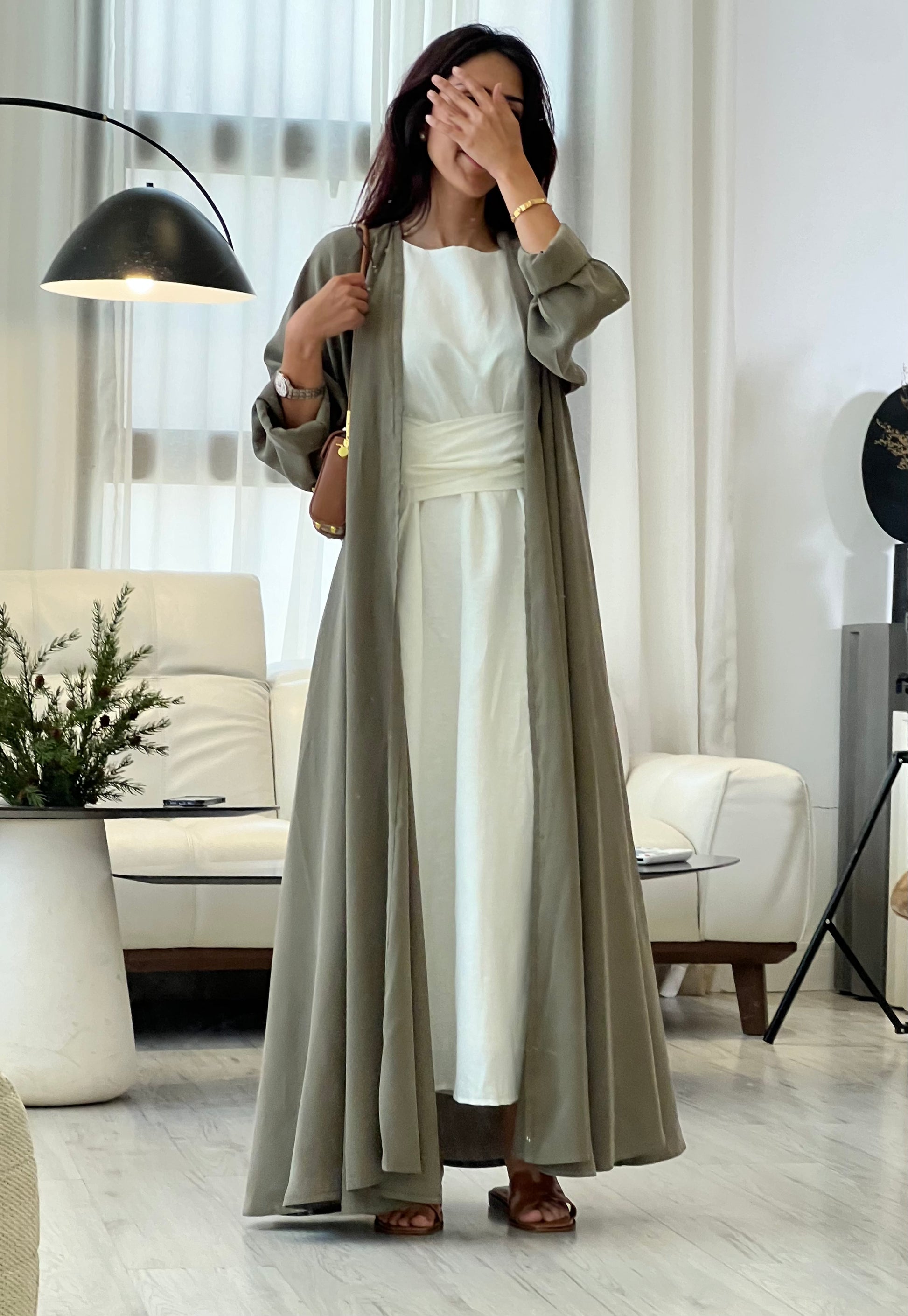 Olive green flowy abaya, front product 